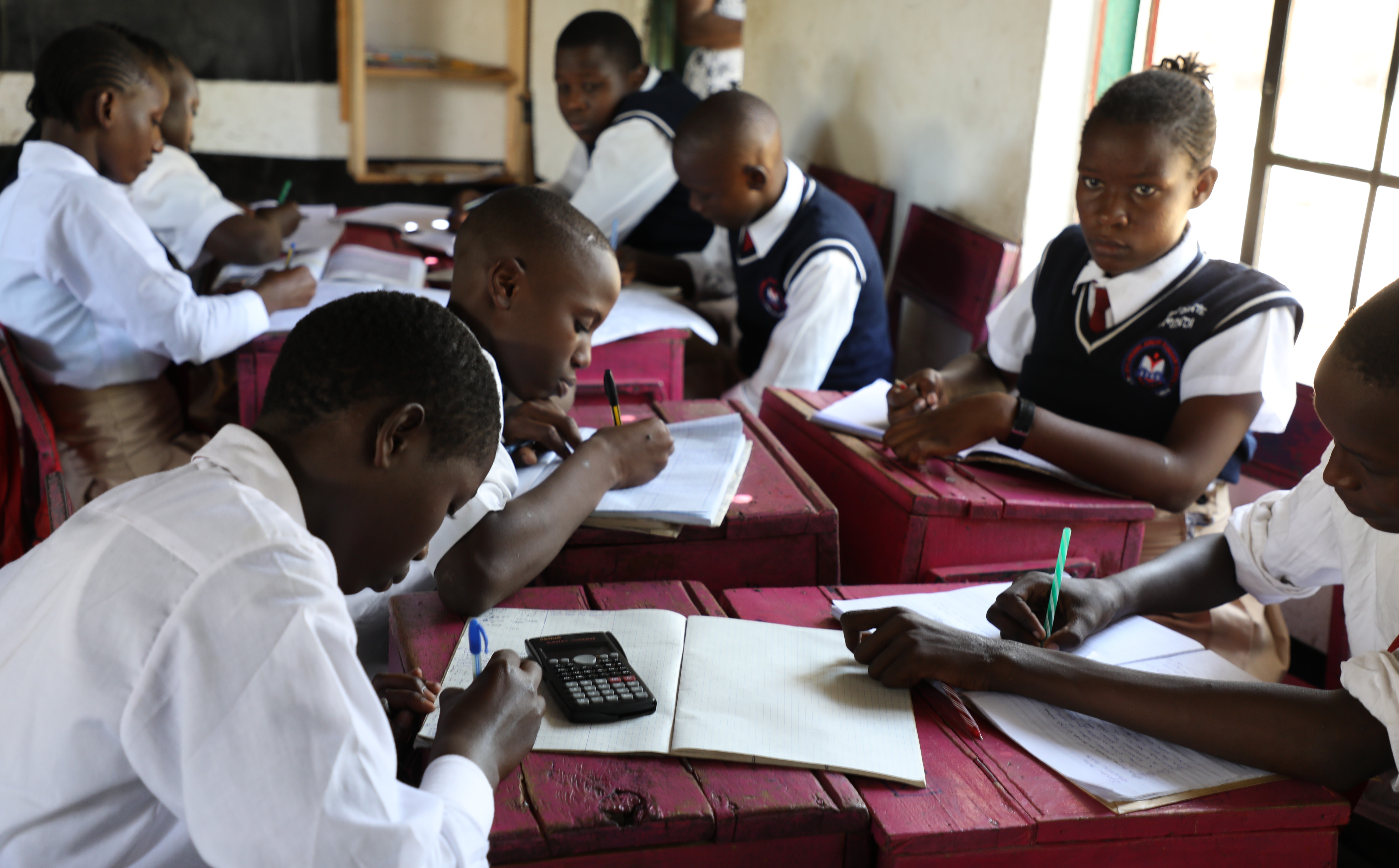 Junior Secondary learners in a lab or workshop